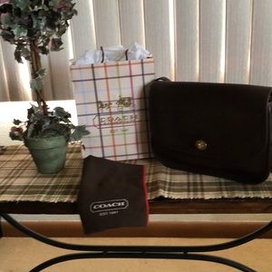 Authentic Coach purse. Dark brown, turnkey lock.